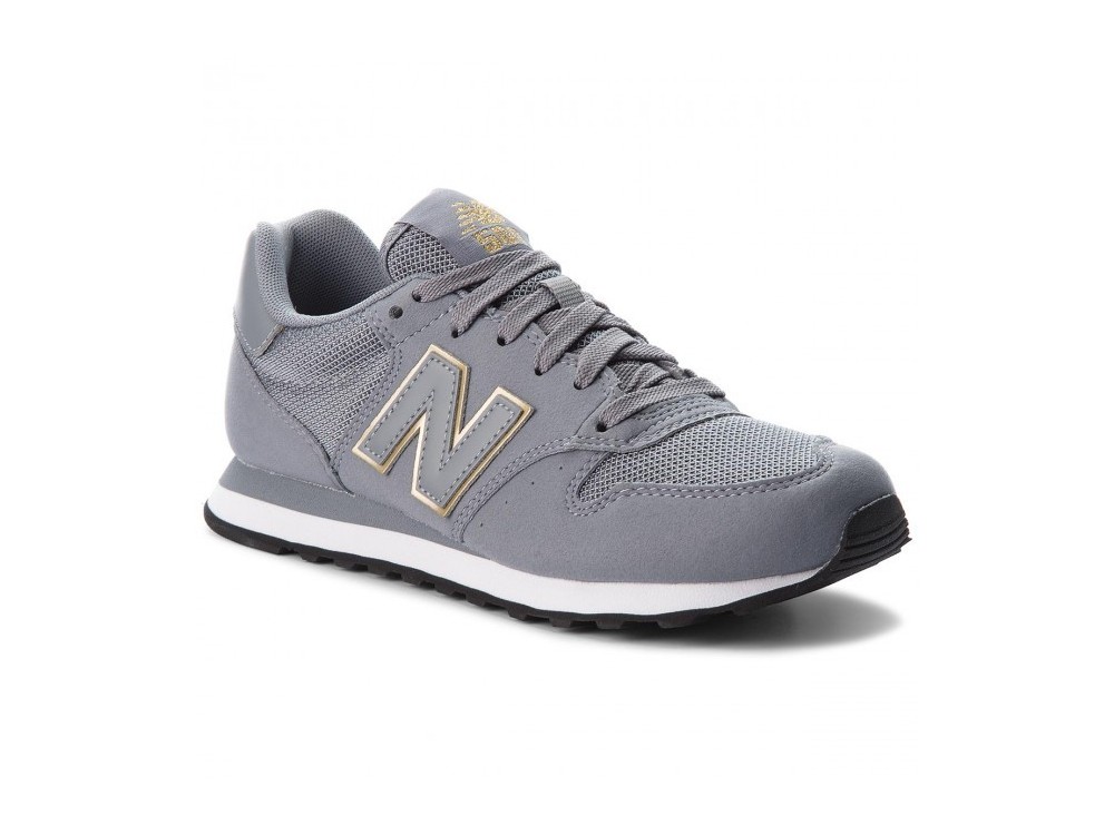 new balance gris y dorado